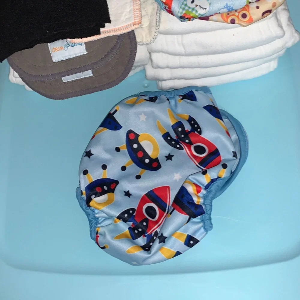 Cloth diaper covers and prefold cloth diapers. #5